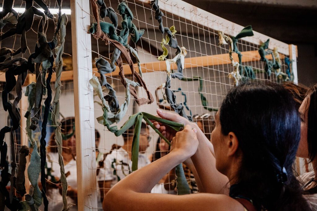 Woman making masking mesh